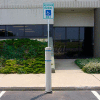 52"H FlexBollard with 8"H Sign Post - Asphalt Installation - White Cover/Blue Tapes
