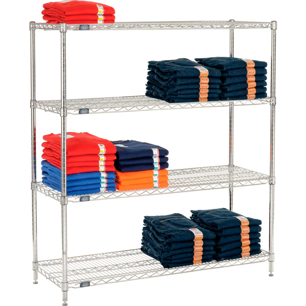 A silver metal shelving unit with four shelves, with folded clothing on it