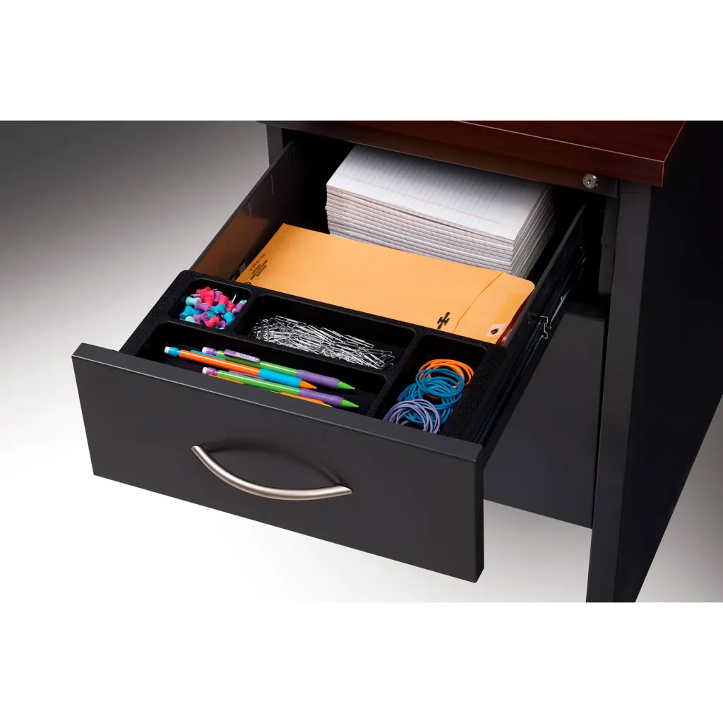 An open desk drawer with office supplies
