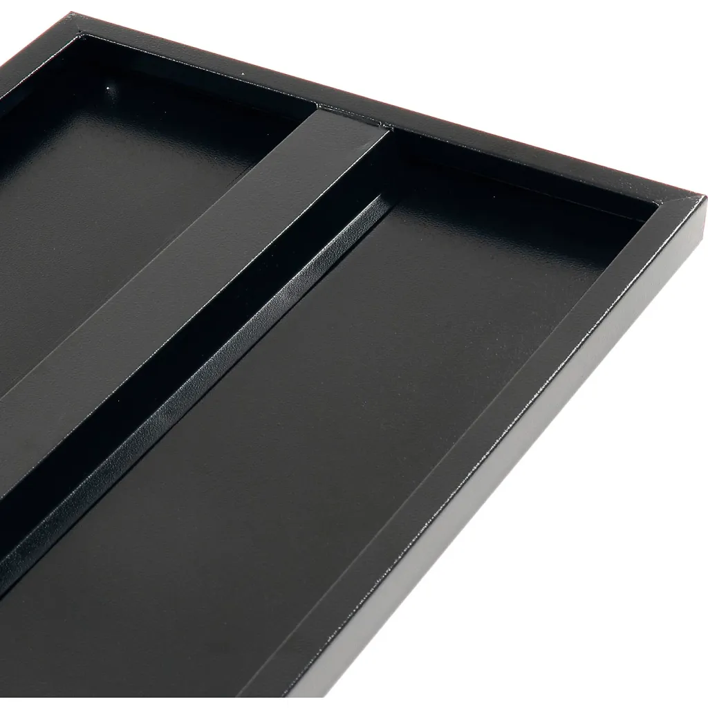 A close-up of a black tray with a divided section.