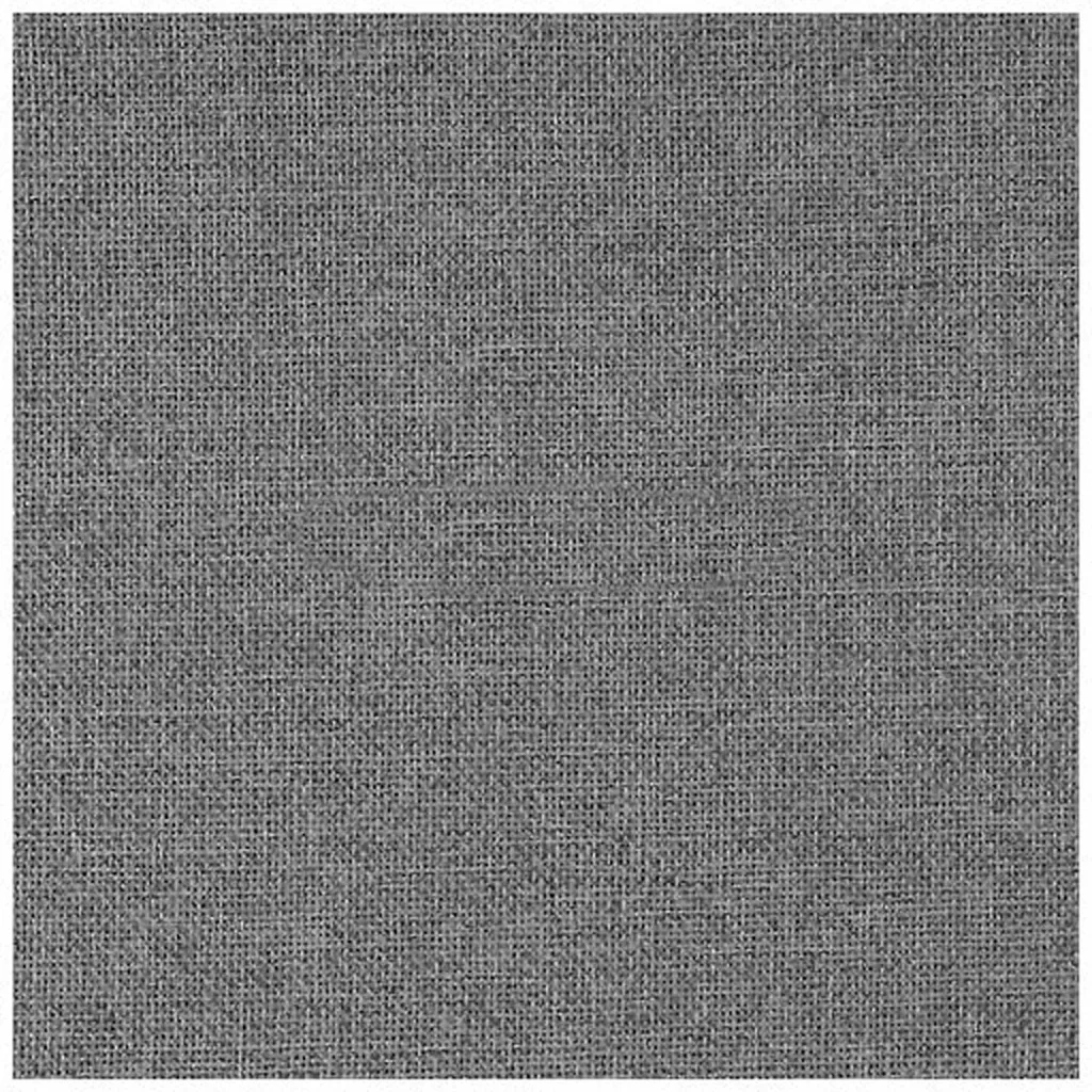 A close-up of the gray fabric of a room divider panel.