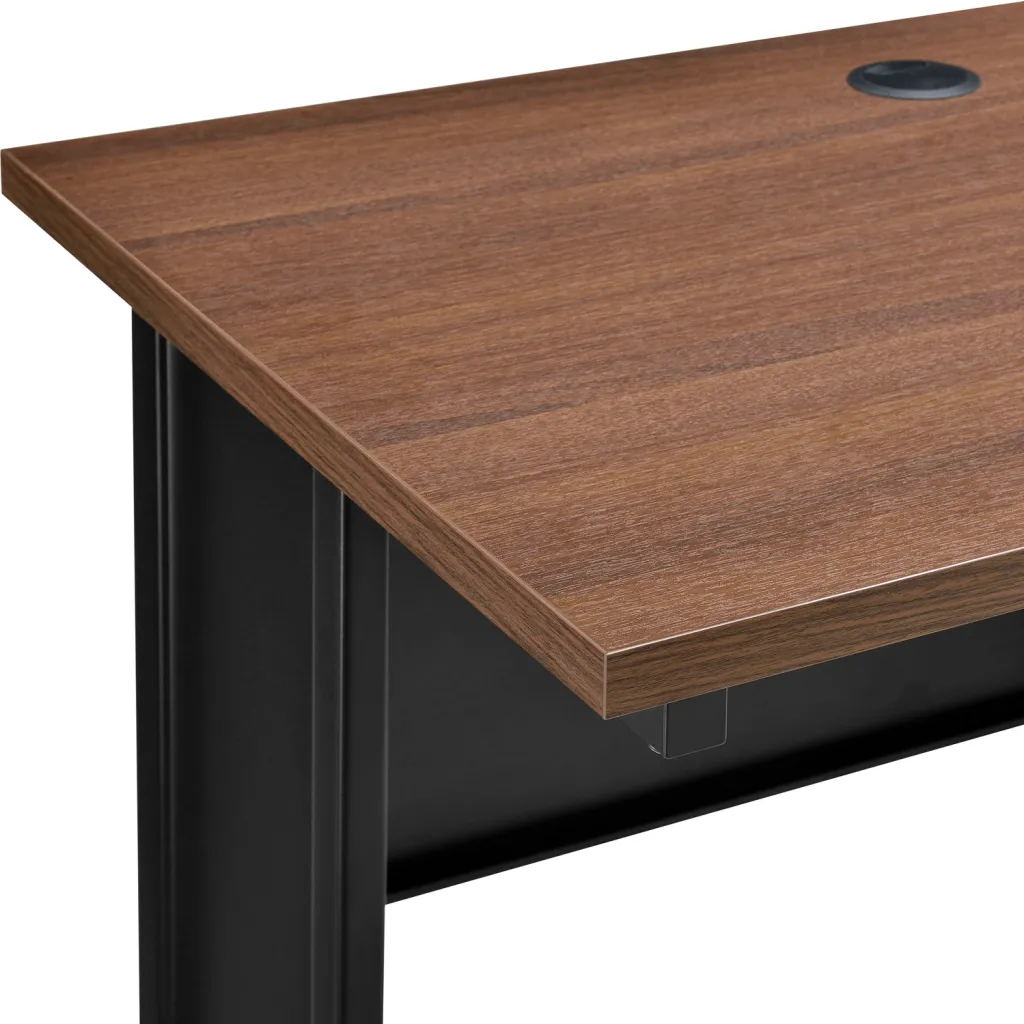 Close-up of brown wooden desk top with black metal leg