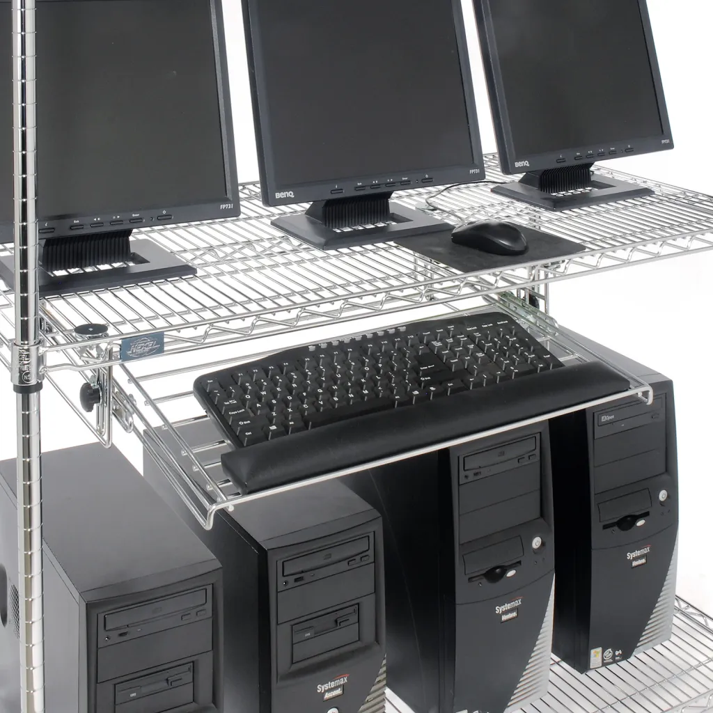 a close-up of computer equipment on a shelving unit