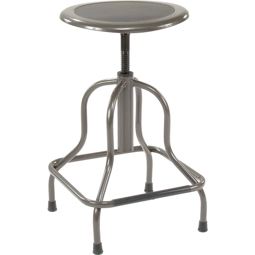 A gray metal stool with a round seat and four legs.