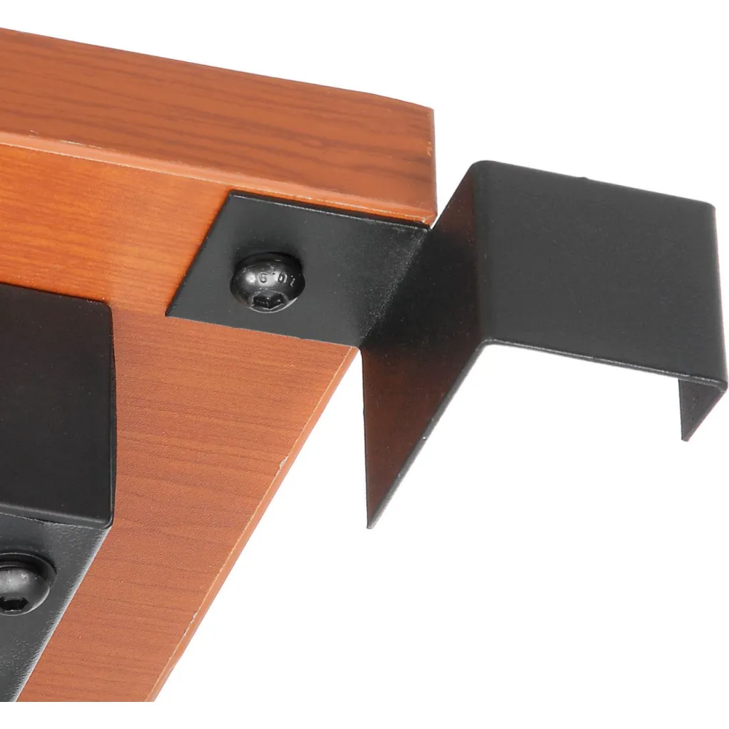 A close-up of a black metal bracket and screw attached to a wooden shelf from another angle.