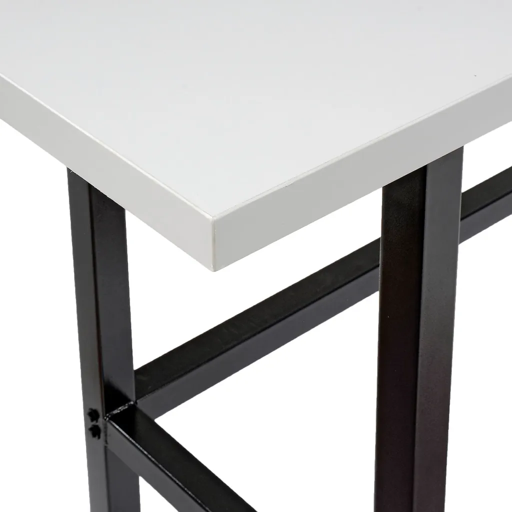 A close-up of the corner of a workbench with a black metal frame and a white top.