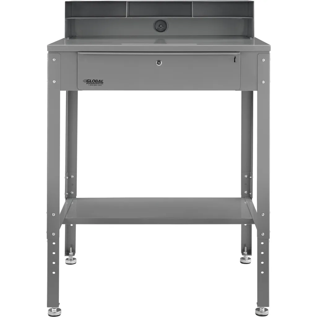 Side angle of the grey metal desk with upper small cubby shelf and lockable drawer, sturdy construction.