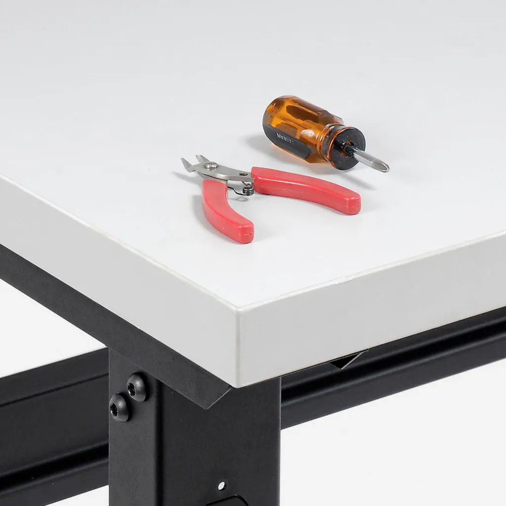 Close-up of workbench corner with tools