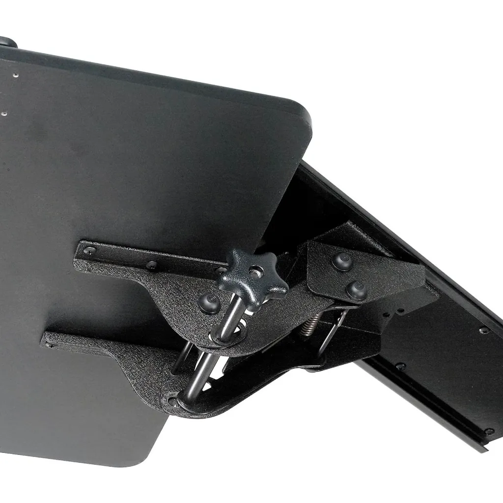 a close-up of a keyboard tray on a workstation