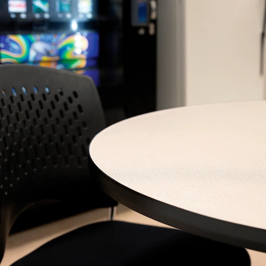 Close-up of table and chair in a room