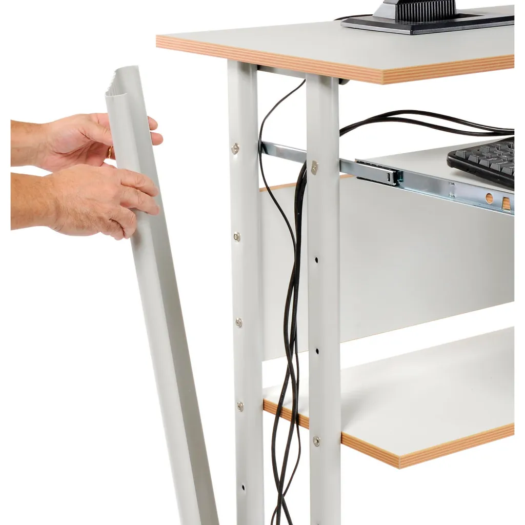 A close-up of a workstation's frame and cables.
