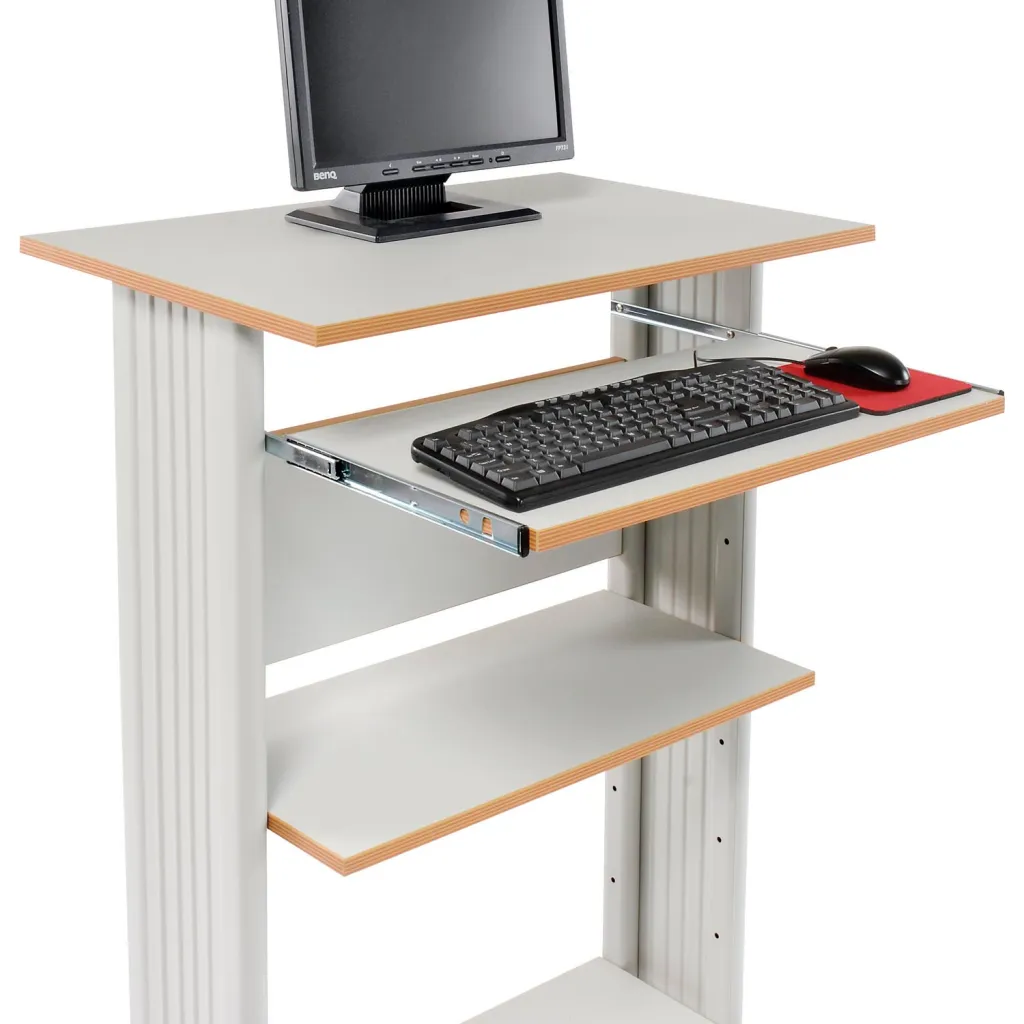 A workstation with a monitor, keyboard, and mouse.