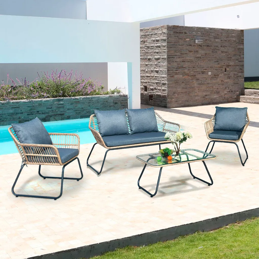 Outdoor furniture set with wicker and metal frame by pool