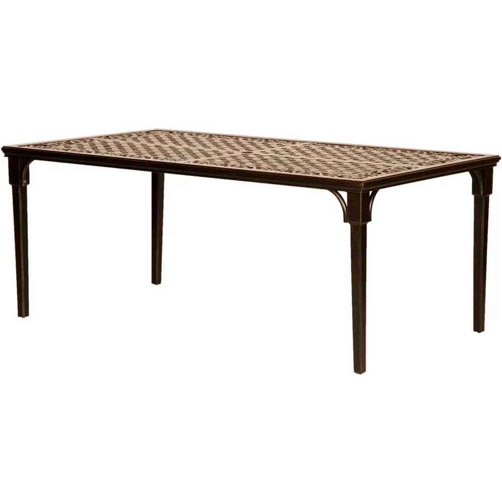 bronze-colored metal table with tan fabric chairs
