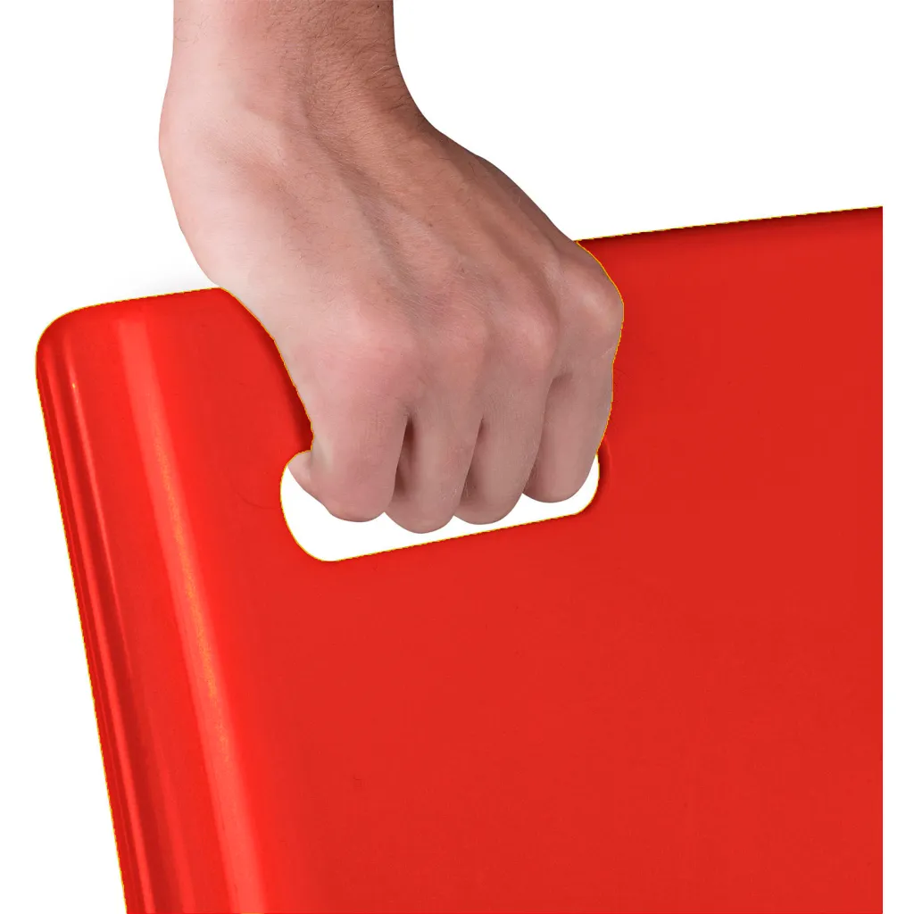 Hand holding red plastic chair by handle