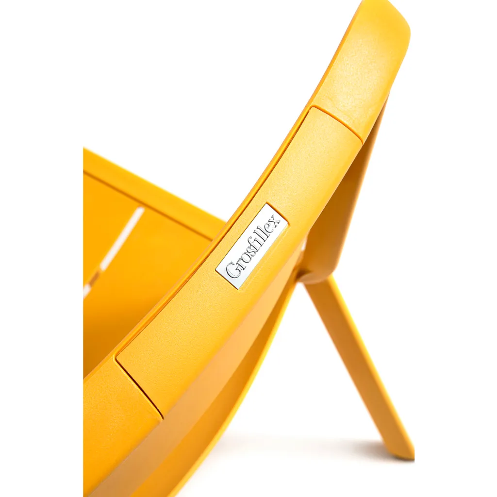 Close-up of chair frame with Grosfillex label