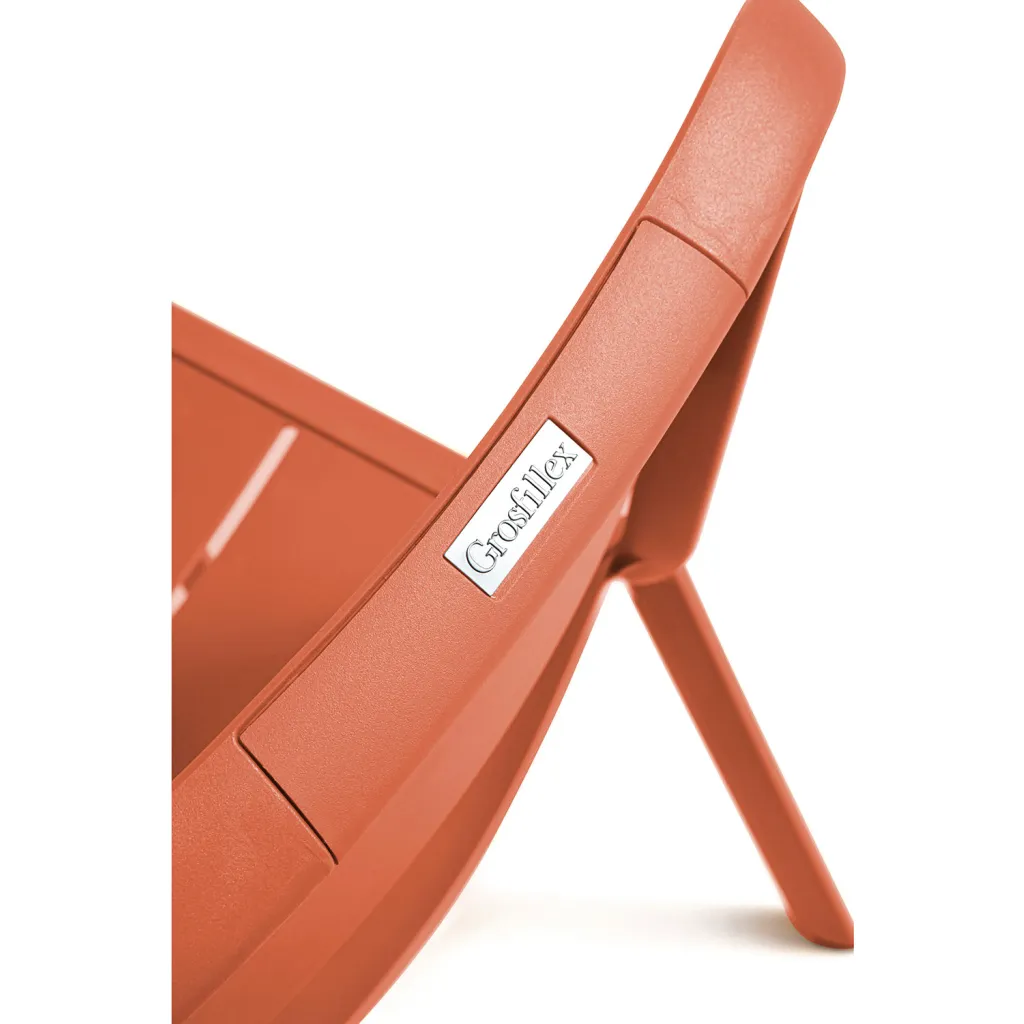 Close-up of chair leg with Grosfillex label