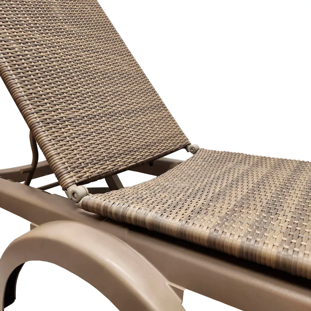 Close-up of woven seat and backrest of outdoor chaise lounge chair