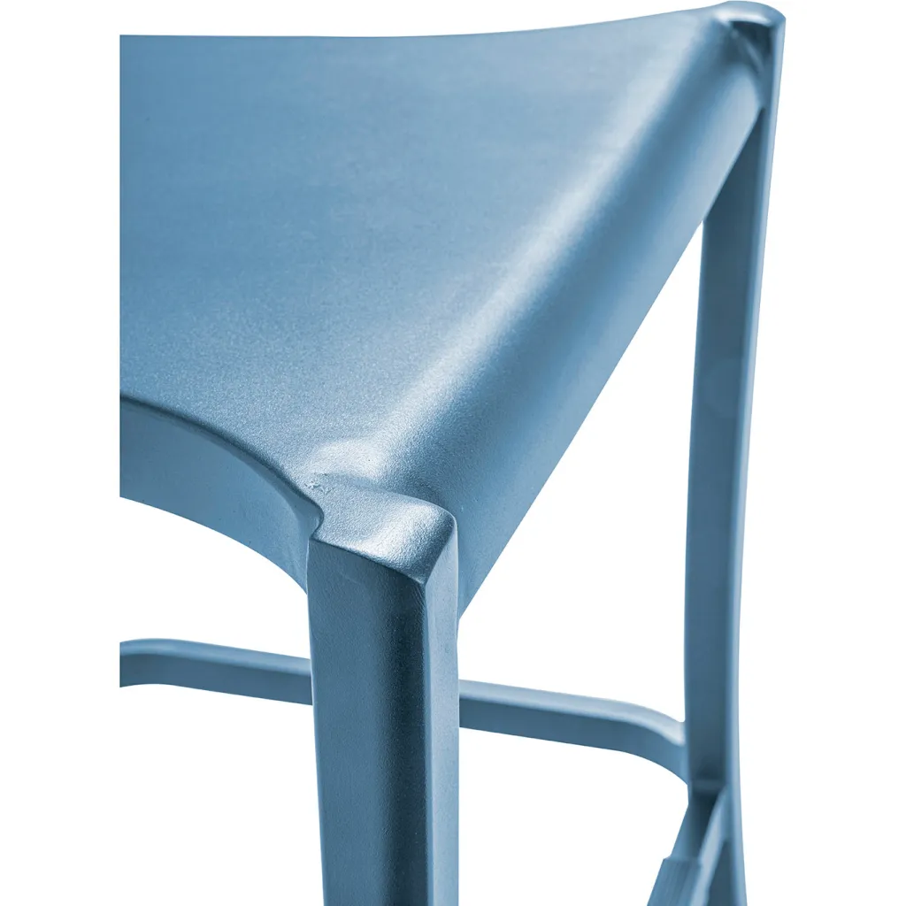 Close-up of blue metal bar stool seat