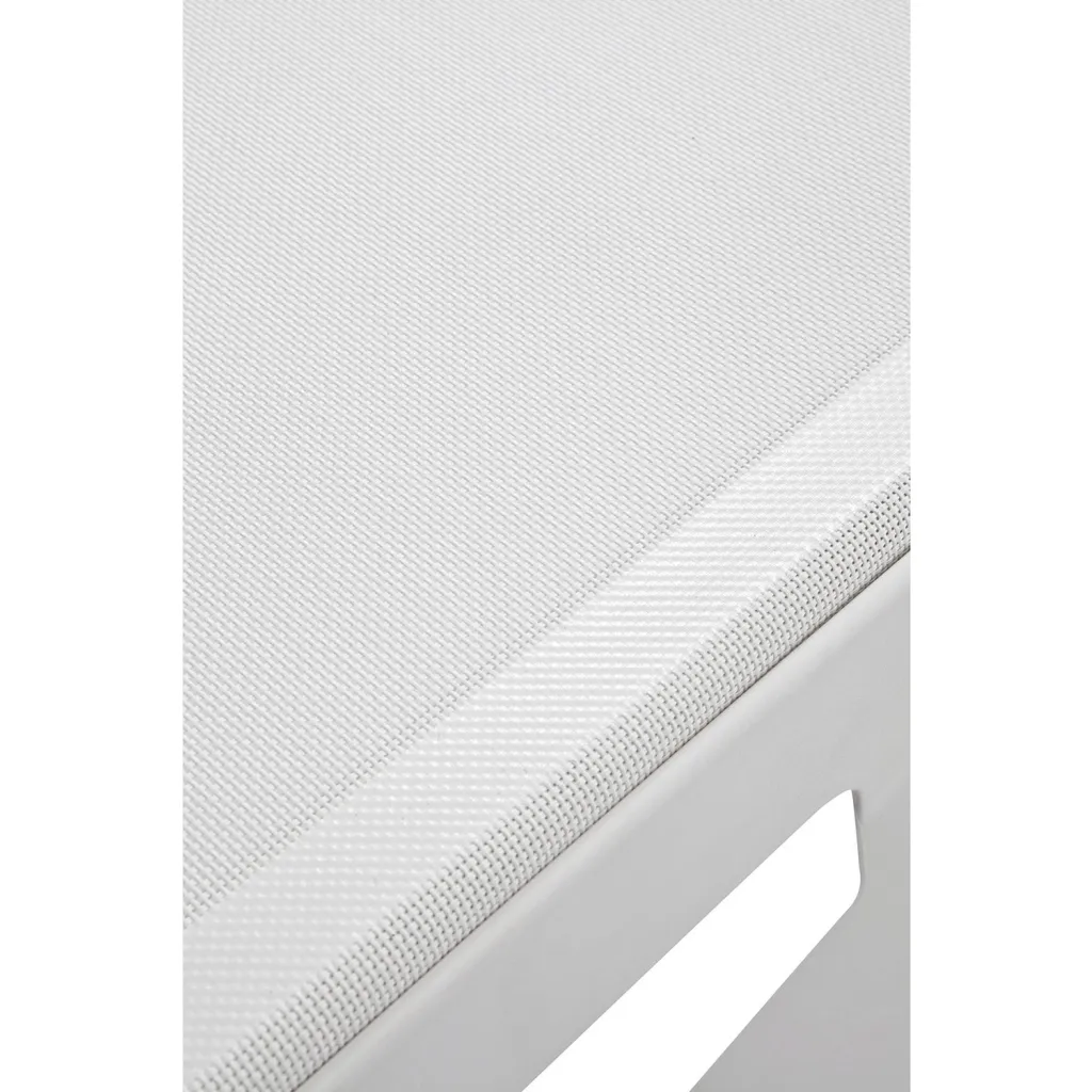 Close-up of white outdoor chaise lounge chair fabric