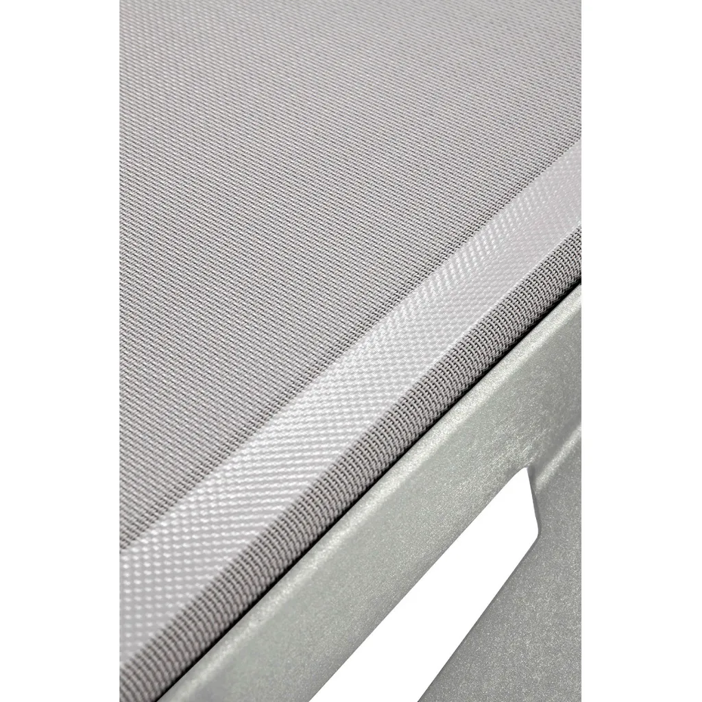 Close-up of gray mesh fabric on outdoor chaise lounge chair