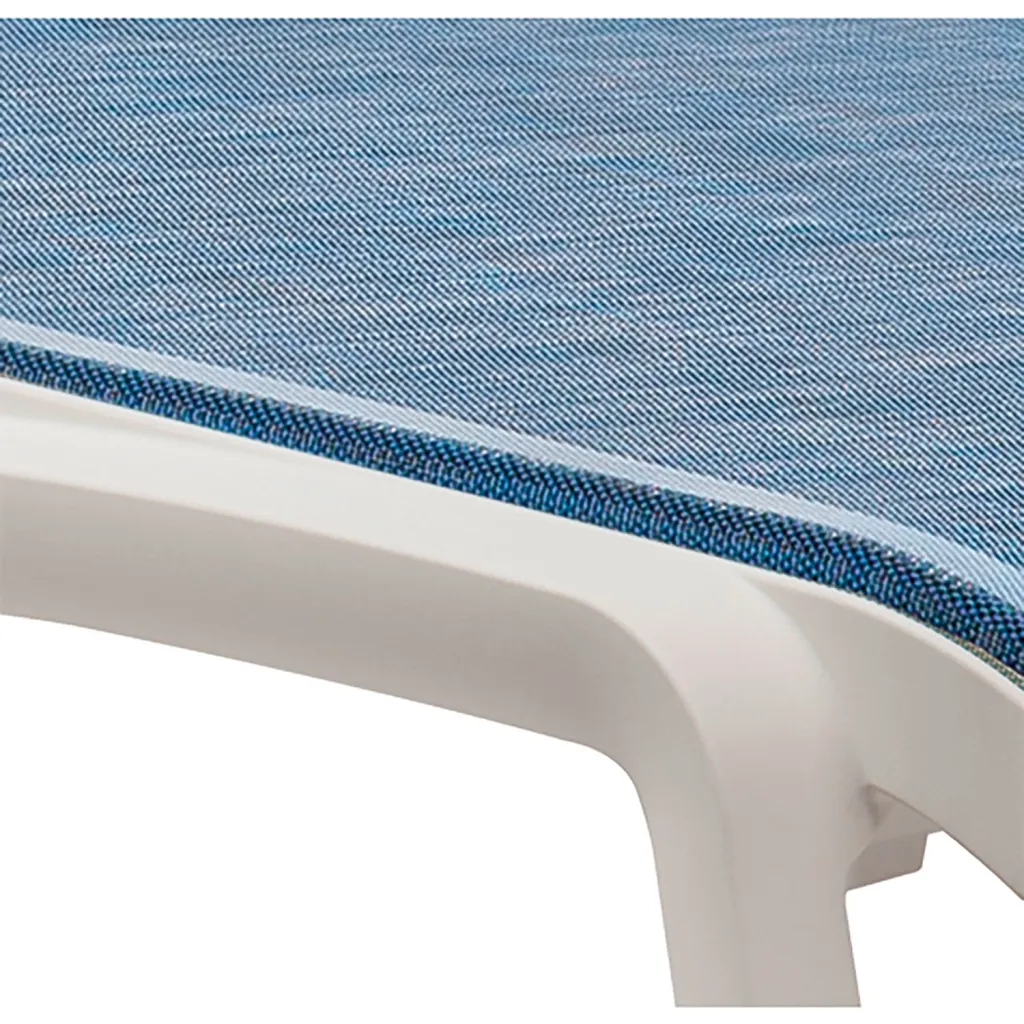 Close-up of blue fabric and white frame of chaise lounge
