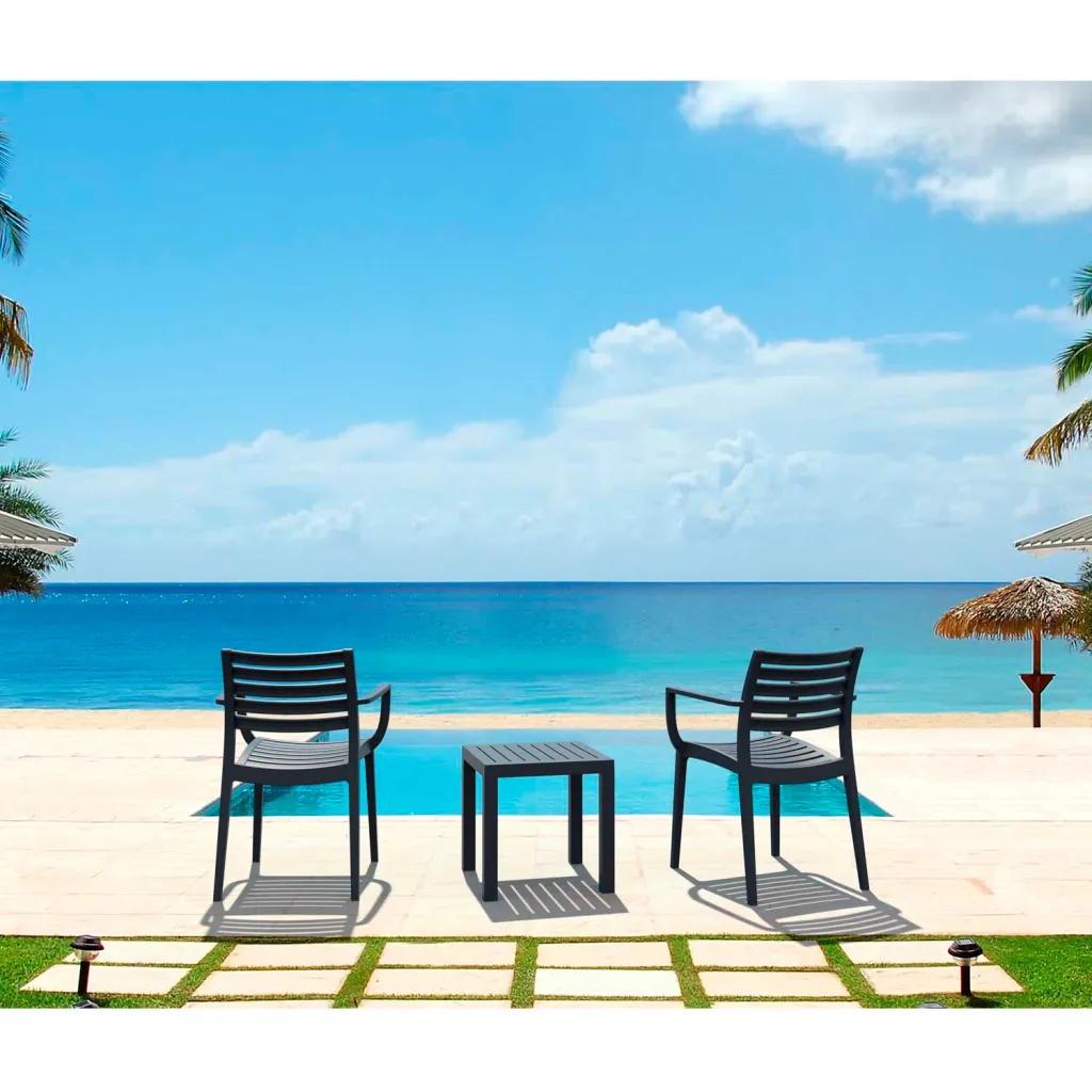 Gray outdoor table with chairs on beach