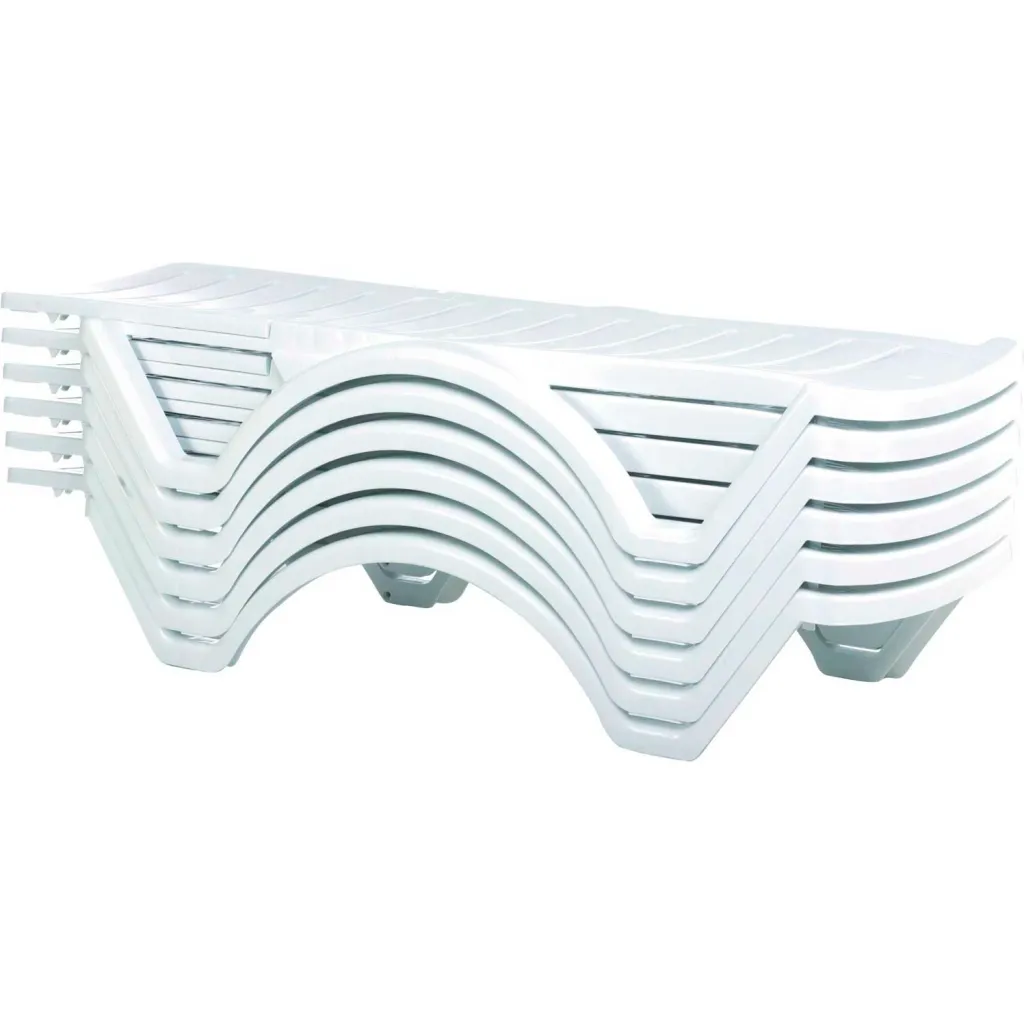 Stack of white plastic lounge chairs