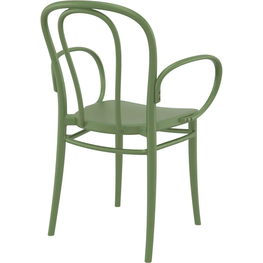 Green metal chair with curved back and armrests