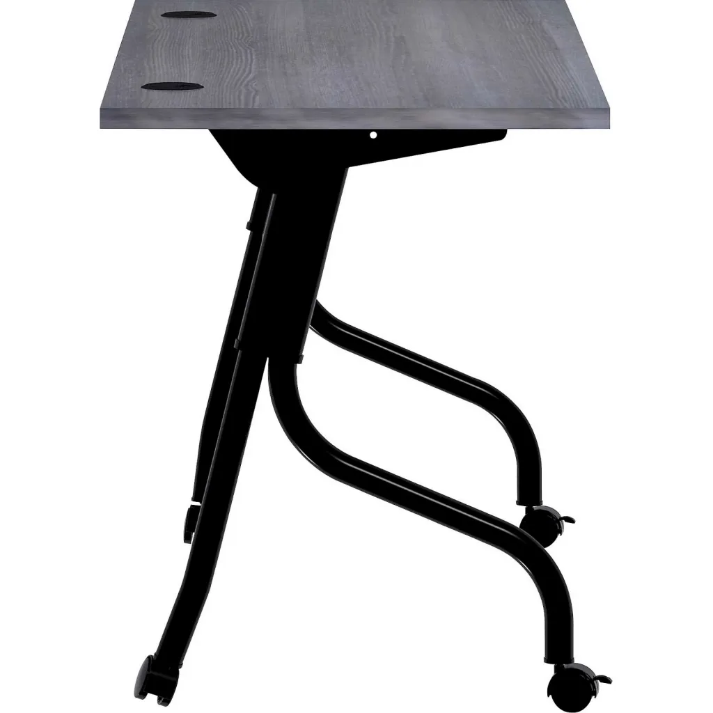 Close-up of gray desk corner with black metal leg