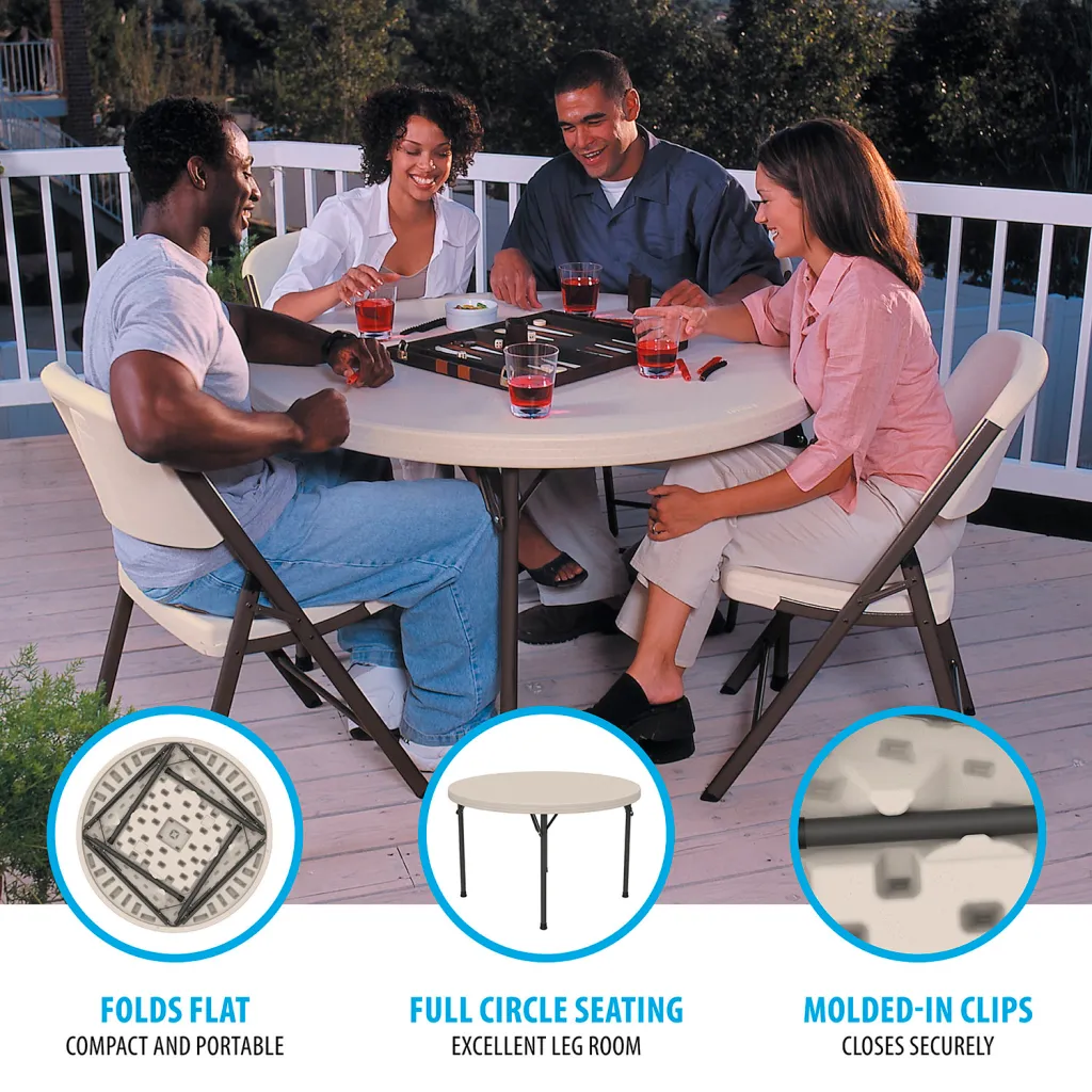 A beige folding table with black metal legs set up on a deck with people playing games.