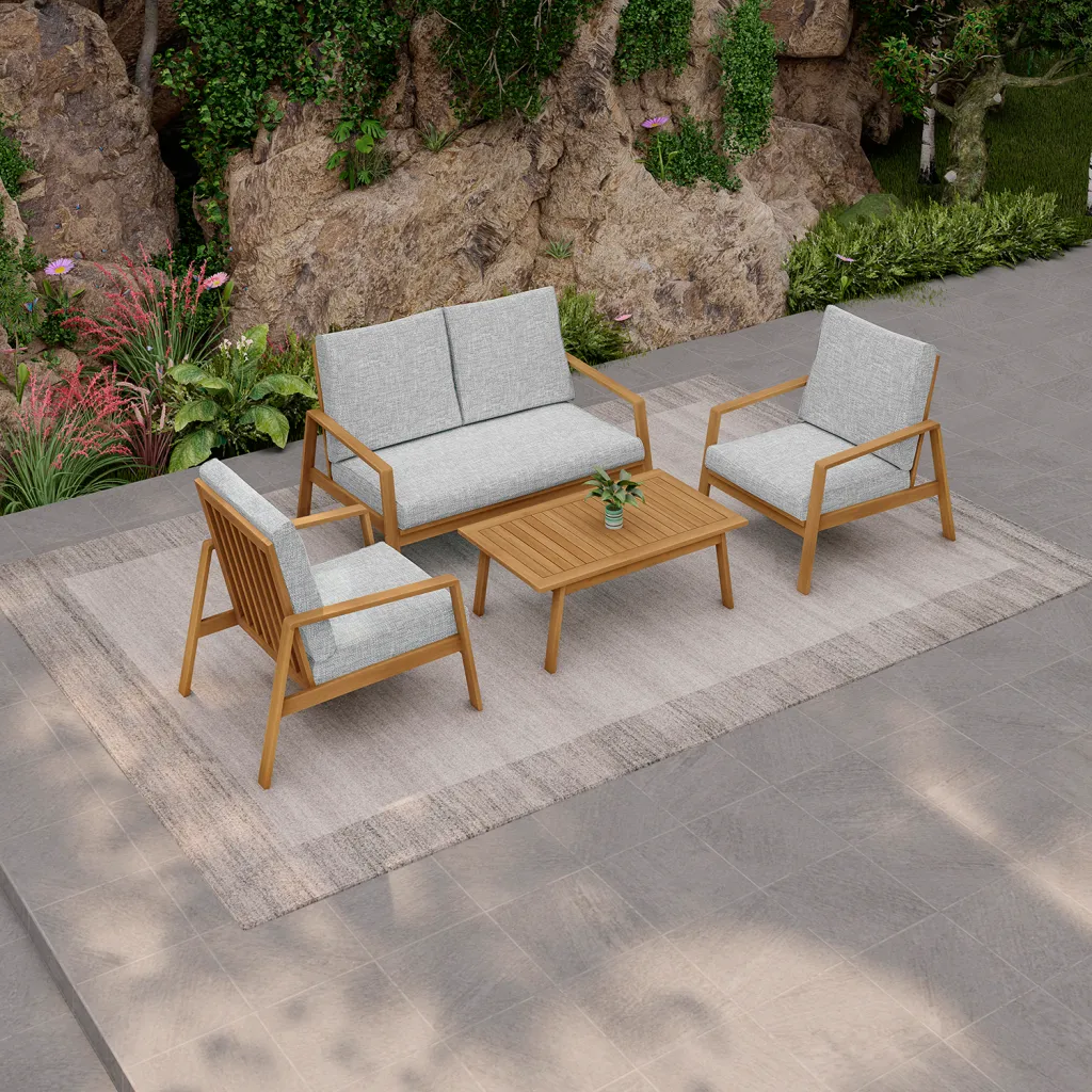Outdoor furniture set on patio with rocky background from different angle