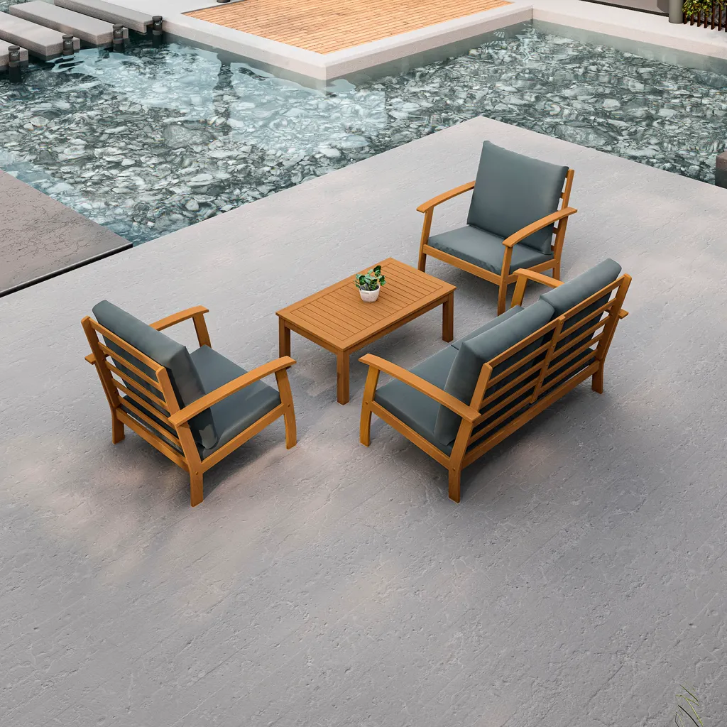 Patio furniture set with blue cushions and wooden frame by pool