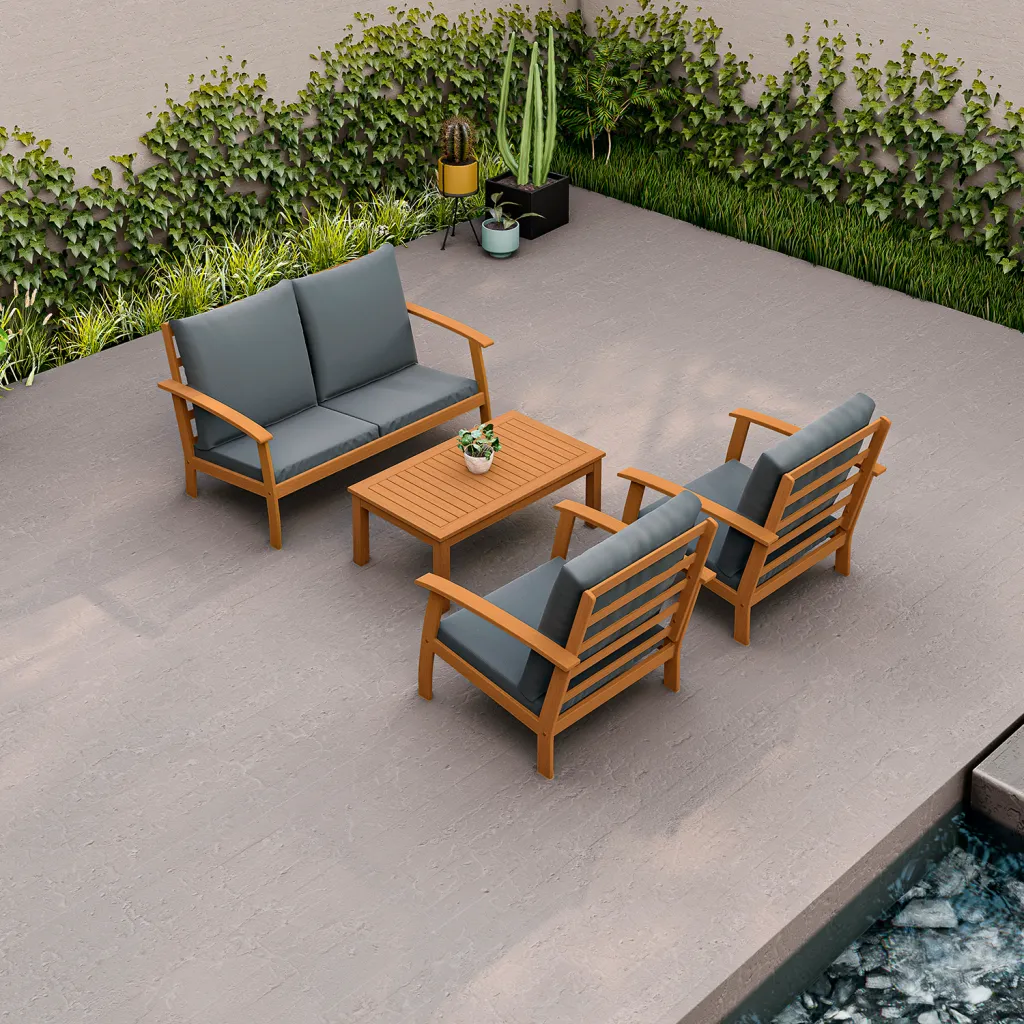Patio furniture set with blue cushions and wooden frame on patio