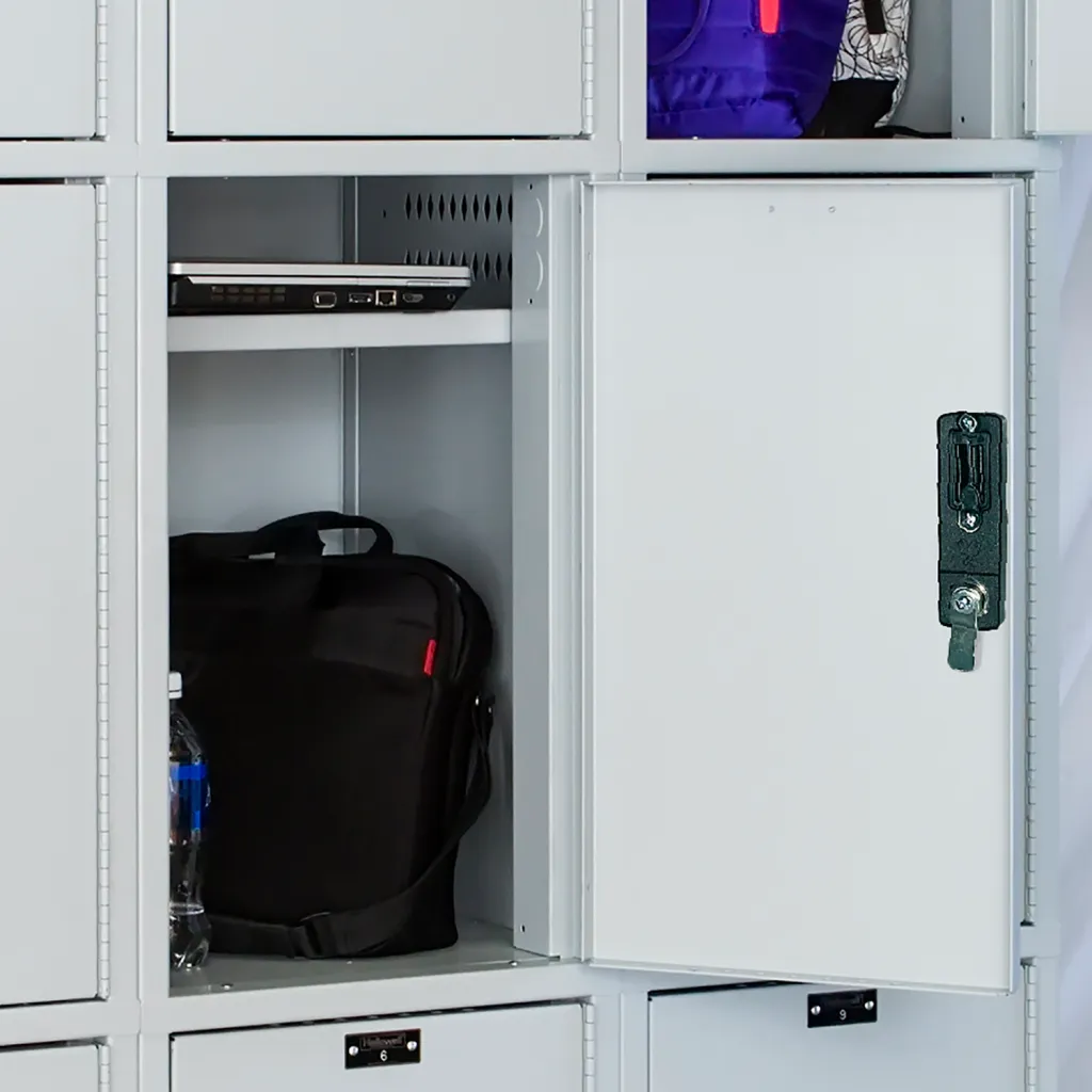 A locker with its door open, revealing an empty interior with a single shelf and a black handle on the right side.