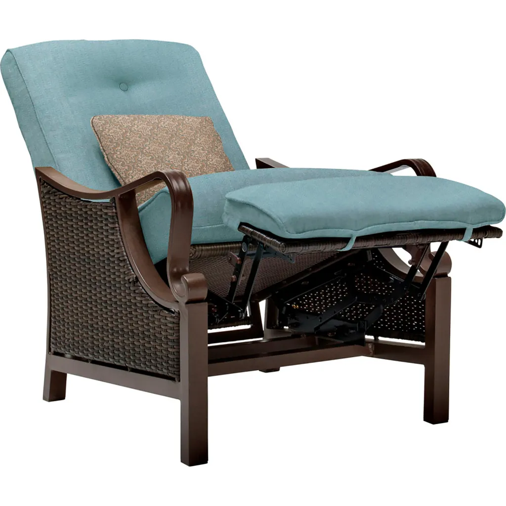 Outdoor reclining chair with blue cushioning and brown frame from side view
