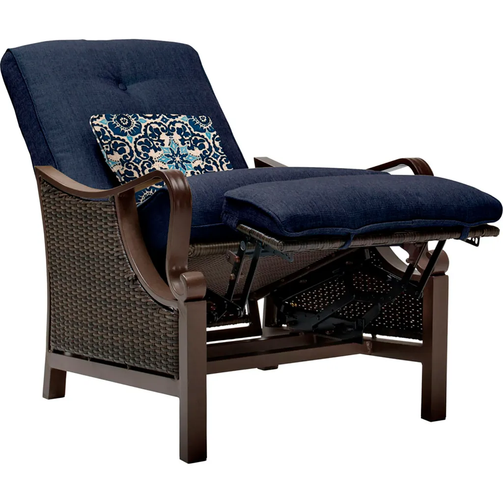 Navy blue reclining chair with brown frame and patterned pillow from side