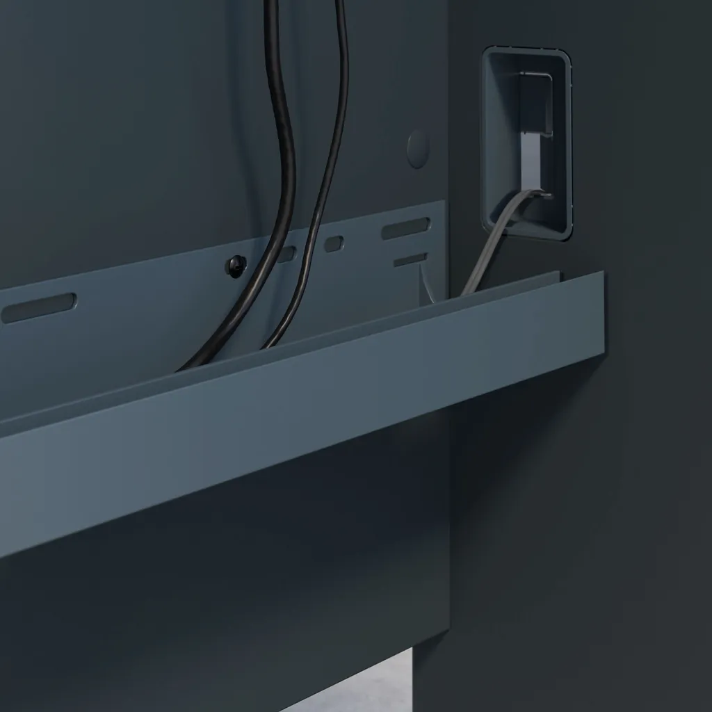 A close-up of a desk's cable management system