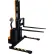 Vestil Fully Powered Narrow Mast Stacker SNM15-62-AA with Adj. Forks/Straddle Legs - 1500 Lb. Cap